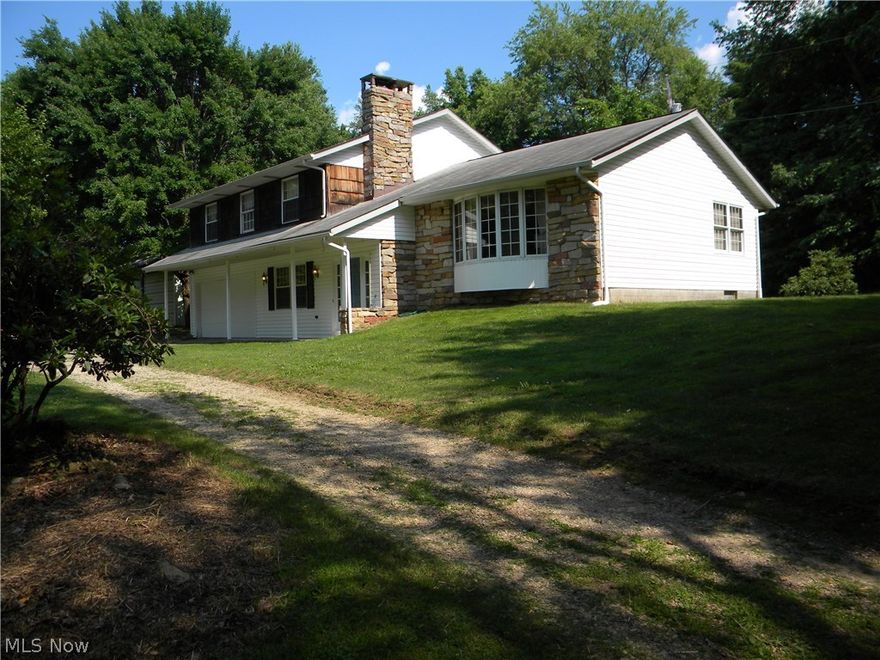 Unique Country Estate!  Come to see this 4 bedroom 3 bath country home sitting on over 28 acres of open and wooded paradise.  You'll need to look hard just to find this hidden gem!  Whether you want horses, or just a place away from everyone, yet minutes from Akron, Cleveland and surrounding areas, this may be the one for you to see.  Economical geothermal heating system, large 40' x 30 ' barn, fireplace and large bedrooms are just some of the amenities this home has to offer.  This Estate is being sold "As-Is", so bring your carpet and paint....and restore this gem to its original beauty. (Home is located off of 224, NOT WATERLOO. Please do not go onto the property on Fox Lane off of Waterloo, it is not the correct property)