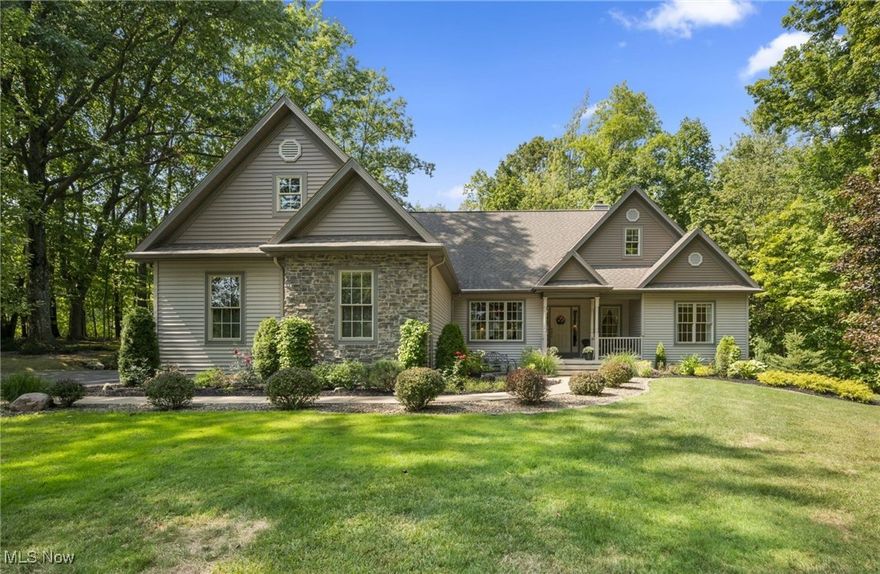 One floor living at it’s finest! Welcome to this meticulously maintained Ranch home, set back on a serene 3+ acre wooded lot. Pride of ownership shines throughout this 1-owner, pet & smoke-free residence, offering 3 bedrooms, 2.5 baths, and over 2,175 sq ft of living space. A beautifully updated eat-in kitchen offers stainless steel appliances, center island, breakfast bar, quartz countertops, stone backsplash, soft-close cabinetry w/ deep drawers & a dinette area w/ bay windows overlooking the backyard. The kitchen opens to a vaulted great room w/ a stunning floor-to-ceiling stone fireplace & palladian-style windows that frame peaceful views of the park-like backyard. A spacious dining room w/ tray ceiling is ideal for entertaining. The primary suite boasts tray ceilings, his-and-her closets, and a large ensuite bath w/ double vanities & walk-in shower. A 1st-floor laundry room w/ sink & built in counters provides added convenience and a 13-course basement offers abundant storage & endless possibilities for finishing. Outdoor living is equally inviting w/ a welcoming front porch, perfect for enjoying the quiet surroundings. The back of the home has a spacious circular patio, perfect to relax & entertain while enjoying the private yard. An attached oversized 2-car garage, equipped with hot & cold water & 220V service, and outdoor shed round out the tour. Tankless water heater provides on-demand hot water and lower utility costs. Recent updates include: Replaced kitchen cabinets, backsplash, island, breakfast bar, quartz countertops, stove, refrigerator, dishwasher, garbage disposal (2019), carpet in great room, dining room, primary bedroom (2020), painted kitchen, family, dining, laundry rooms, & primary bedroom (2020). INCLUDED are all kitchen appliances except microwave, washer/dryer, matching furniture pieces below shelves in great room. Conveniently located near OH-44, US-6, 5 miles from Chardon Square, schools, shopping, restaurants, & other local attractions.