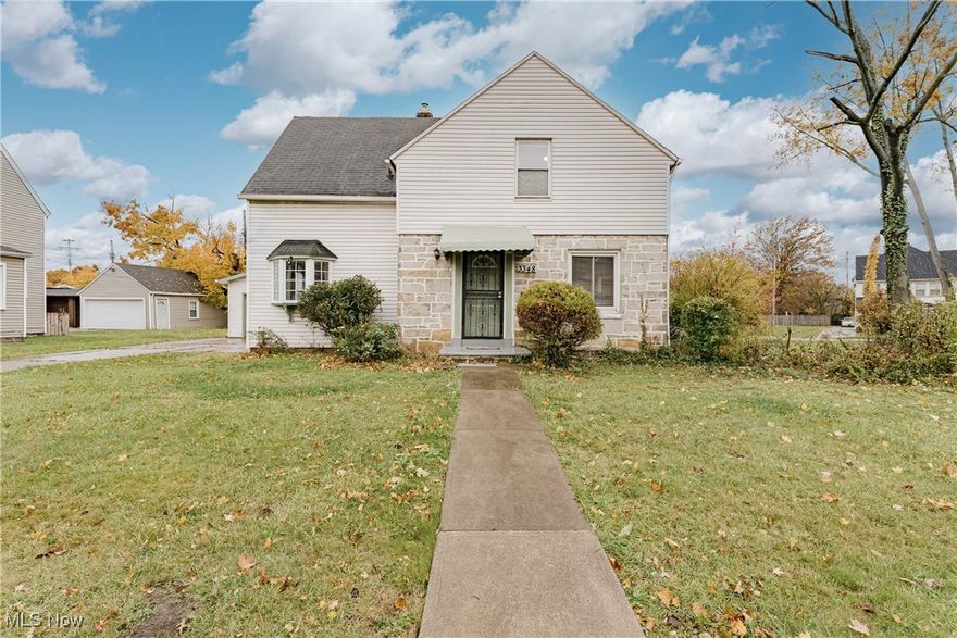 Welcome to 3348 Milverton Rd – A Lovely Shaker Heights Colonial Full of Charm and Warmth! Nestled in the friendly Moreland neighborhood, this delightful home perfectly blends classic character with modern touches, creating the ideal space for comfortable family living. Step inside to a bright and spacious living room, where beautiful hardwood floors flow seamlessly throughout much of the home. The open dining area connects effortlessly to the back patio, offering the perfect setup for everyday meals or weekend gatherings. The kitchen features hardwood cabinetry, tile flooring and backsplash, plus a brand-new refrigerator and range—ready for your culinary adventures! Just off the kitchen, you’ll find a generous family room that can easily serve as a bedroom, rec room, or versatile bonus space—ideal for playtime, a home office, or cozy movie nights. A small mudroom at the back entrance adds extra convenience, perfect for keeping shoes, coats, and backpacks organized. This area also provides access to a handy half bath and the backyard, enhancing the home’s flexibility and flow. Upstairs, you’ll discover three inviting bedrooms, all featuring gleaming hardwood floors and fresh, crisp paint. A full bathroom completes the second floor with clean, timeless finishes. The partial basement offers laundry hookups and additional storage space, while the fully fenced backyard provides a safe, private area for children and pets to play. A detached garage adds even more convenience. This adorable and well-loved home is move-in ready and located close to schools, parks, shops, and Shaker Heights’ many community amenities. Come see why 3348 Milverton Rd is the perfect place to call home—where comfort, charm, and family living come together beautifully!