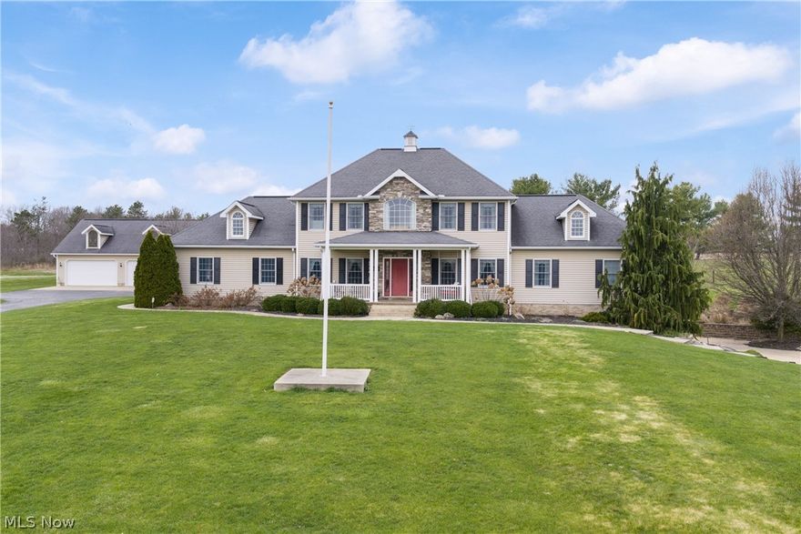 Exciting Opportunity! Quality, Custom-Built Home On 7 Acres, Finished Walkout Basement, Panoramic Views, Stocked Pond, Tillable Land, 32x40 Detached, Heated Garage. Stark Co., Tuslaw LSD. Live Onsite Auction with Online Bidding Available. Absolute auction, all sells to the highest bidder. ONLINE BIDDING BEGINS FRIDAY, MAY 1, 2026, AT 9:00 AM, AND AUCTION LIVE ON-SITE BIDDING WILL BEGIN SATURDAY, MAY 2, 2026, AT 10:30 AM. Custom-built in 2007, this well-maintained home sits on an elevated lot overlooking a fully stocked 1+ acre pond. The main level features an open eat-in kitchen with custom cherry cabinetry, wraparound island, and spacious breakfast nook. Just off the kitchen are French doors that lead to a home office with cherry hardwood floors and a formal dining room. The main floor primary suite features a walk-in closet, jetted tub, and shower, along with a convenient first-floor laundry room just down the hall. A spacious living room with a gas stone fireplace completes the main floor. Upstairs offers three large bedrooms, all with walk-in closets, a Jack-and-Jill bath with double vanity, and a small bonus room or office. The finished lower level includes heated floors, a full kitchen, a theater room with a gas fireplace, a full bathroom, and a large recreation area with walkout access to the patio. Additional highlights include central vacuum, public sewer and water, new A/C in 2017, natural gas whole-home generator, an attached two-car garage with heated floors and hot/cold water, and a central boiler wood furnace installed in 2008 as an alternate heat source. A 32’x40’ detached four-car garage with gas furnace and hot/cold water, perfect for additional storage, workshop, or car enthusiast, plus a 12’x30’ storage shed. The property also features 4.25 acres of tillable land perfect for pasture or farming. The gazebo overlooking the pond is wired with electric. All this on 6.85 acres in Tuslaw LSD! A rare find! Stark Co. parcel #10009980.