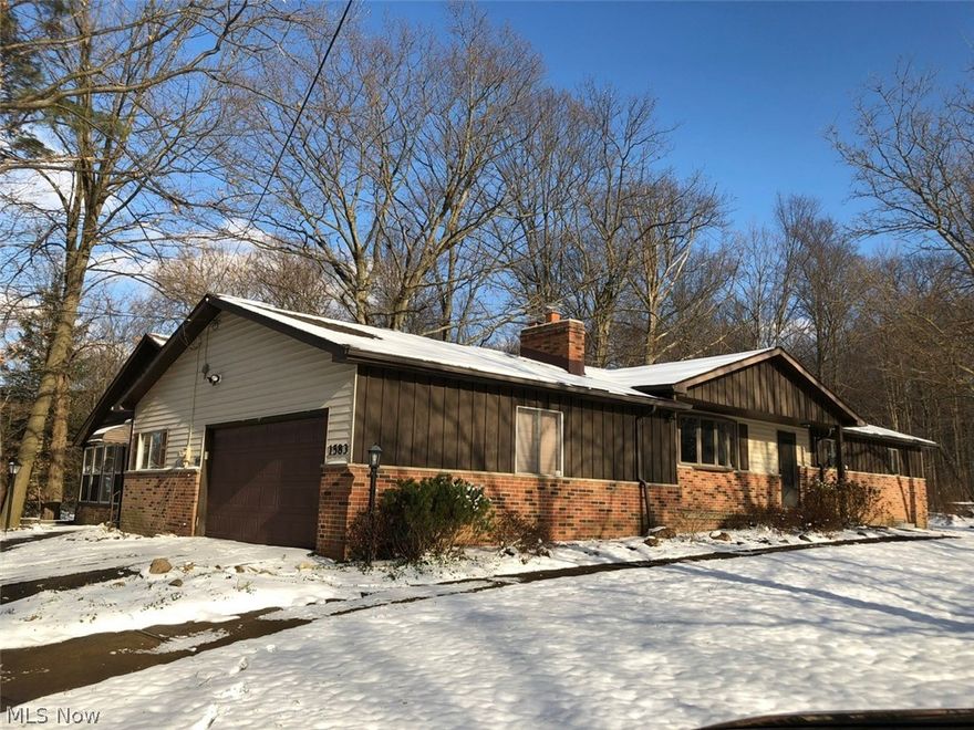 Desirable ranch style home nestled on 2.76 acres in the heart of Brunswick.  Inviting living room boasts gas brick fireplace flanked by built-ins and bow window, leads to formal dining room.  Kitchen offers all appliances, tile backsplash, and small eating area.  Family room with beamed ceiling and French doors to vaulted 3 season room with skylights.   All bedrooms highlight hardwood floors.  Master bedroom with private bath and 2 closets. Lower level recreation room features laminate flooring and woodburning fireplace.  Multi-purpose room/bedroom with recessed lighting and closet.  Access door to exterior/outdoor staircase.  Improvements include roof (2018), water heater (2017), A/C (2017), Carrier furnace (2007), and more.  2 c garage. Circular drive. One owner.