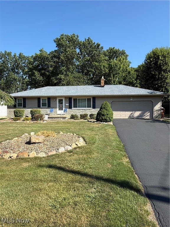POLAND RANCH! Well maintained 3 bedroom 2 bath. Nice size rooms, Open Kitchen/Dining room. Finished Basement with full bath. Cozy 3 Seasons Room, Nice size, private fenced in backyard with fire pit. Many updates.