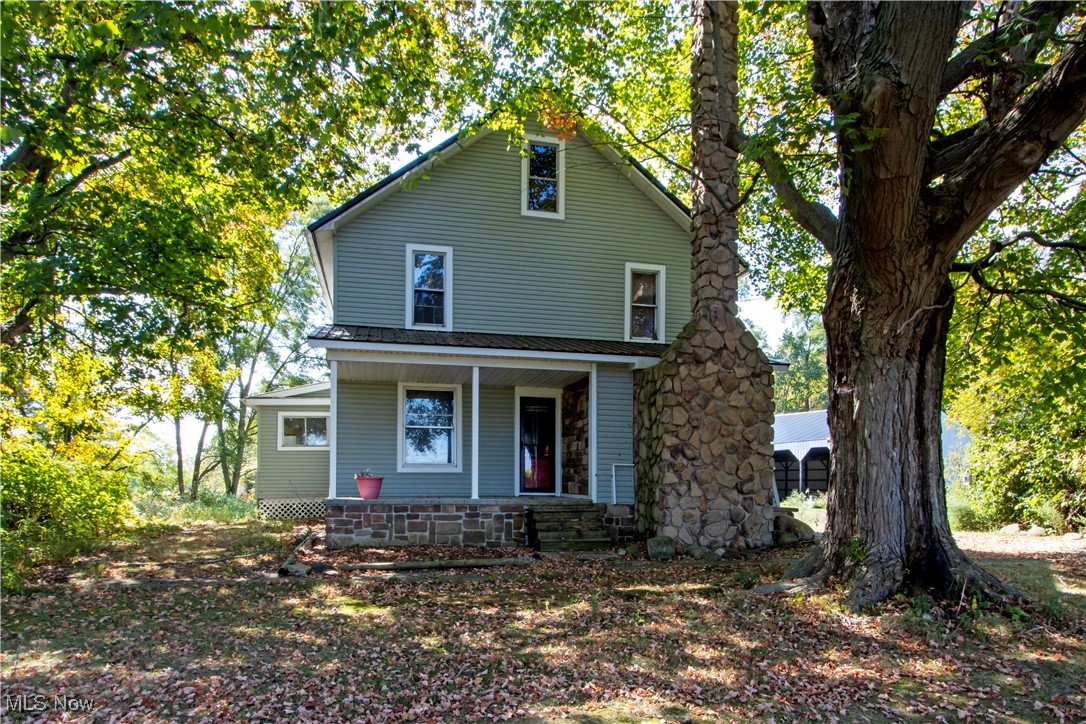 This classic farmhouse is full of character and ready for your personal touch, with high ceilings and hardwood floors under the carpet. Updates include: new foundation, newer furnace, updated electrical, & new hot water heater. This property also includes over 13 acres with a pond. Approximately 4-5 acres are wooded and an impressive 60 x 90 outbuilding outbuilding/shelter with a lean-to and small shed for storage and lawn equipment. This classic 2-story features: 4 bed 1.5 bath 2-story with solid updates! Kitchen and dining room could be fully opened up together.