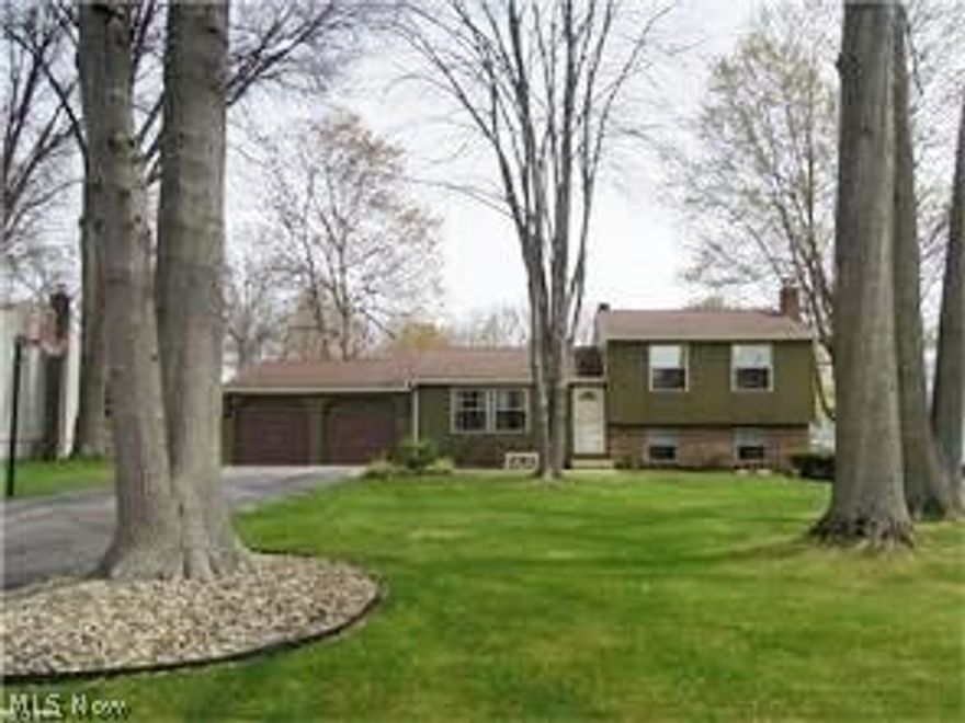 Beautiful home inside & out!  Many updates in last 5 years including kitchen cabinets, ceramic, stainless steel applinaces, all the trim & interior doors.  Living room has new floor & both baths remodeled.  Family room has nice gas fireplace.  Heated garage, shed & the playhouse has bunk beds, cable & a bathroom!  Home is neat & ready to move into.  Seller is grading & seeding back yard after removal of pool.