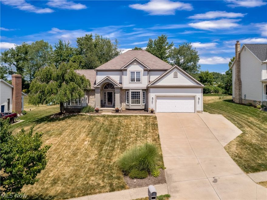 Great location for this 5 bedroom 3.5 bath colonial in Cornerstone Allotment. This one is well maintained with many updates. Enjoy the large private patio with basketball court in backyard and shed. As you walk-in the front door you will notice the open floor plan with new paint and carpet in 2018. Large 26 x 16 great room with fireplace leads to a large eat-in kitchen with island. New GE stainless steal appliances new in 2018. First floor also features a formal dining room, laundry room and first floor bedroom. Enjoy the bench/storage area new in 2019 as you enter from the garage. Great for storage and shoes. Upstairs offers a large master bedroom with a huge walk-in closet w/built-ins and large master bath. Two more bedrooms w/another full bath upstairs. Basement has a huge rec room, full bath, 5th bedroom and storage area. New 97% eff furnace, A/C and digital thermostat new in 2017. Heated garage. This one has too many amenities to list all and is truly a must-see at this price. Wal