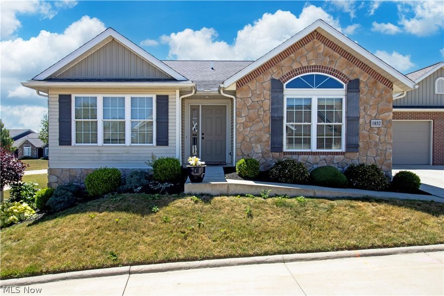 Popular Orrville condo association and condo layout.  Two-bedroom, two full bath condo.  The lower level is unfinished and has many possibilities if one would like to finish it.  Through the front door and into the open living room with fireplace.  The kitchen has stainless steel appliances and overlooks the living room.  Laundry is on the main level.  Two car garage with extra room in front of garage.