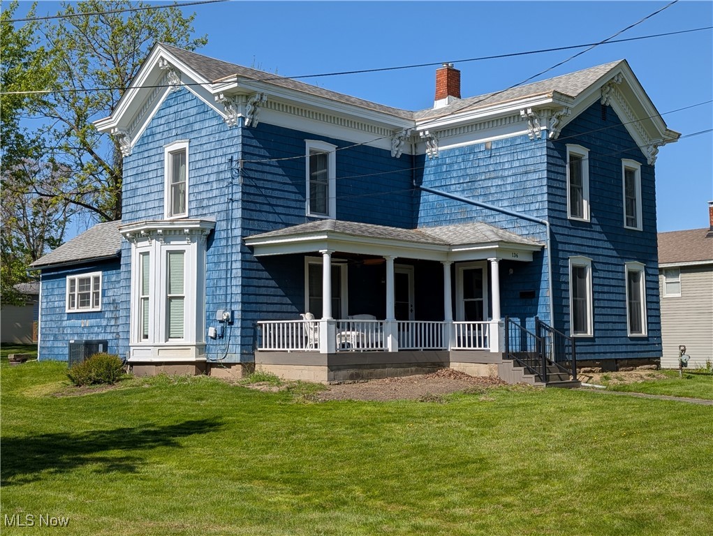 Nestled in the heart of Newton Falls on a large double lot sits this charming 3BR/2BA farmhouse built in 1880. Over 2,000 heated Sq. Ft., it has been lovingly restored and updated by blending its timeless character and craftsmanship with modern updates. Only a few homes away from the public library, its remodeled front porch provides a tranquil setting to enjoy the relaxing rhythms of small town life. The home is fully renovated from the walls in, including all new insulation, walls, ceilings, and new double pane, double hung windows throughout. It has stunning new flooring all downstairs. The stairs and upstairs halls are solid oak. All bedrooms are carpeted for comfort and quiet. Holiday gatherings are encouraged by the beautiful dining room with its Bay window along with the Heart of the Home, which is its large, bright eat-in country kitchen. This remodeled kitchen comes with all new cabinets with lots of storage space, stainless steel appliances, a gas stove with double ovens and a custom built oak range hood. Three large and attractive bedrooms, each with ceiling fans and spacious closets, provide for a tranquil rest.
All plumbing and electrical components have been replaced with proper code materials. The home enjoys central gas heating and air conditioning and the HVAC system was replaced this past winter. The gas water heater was replaced in 2023. The large basement measures about 750 sq. ft. and contains the washer and dryer.
Recent exterior maintenance includes the preparation and white painting of all exterior trim and eaves, including the many large and ornate original wooden double corbels resting beneath the eaves of the house and Bay window. However, no painting of the distinctive blue cedar shakes on the exterior siding was performed in deference to the potential preferences of a future owner who might envision a somewhat different exterior showcase for this unique home. This is a "must-see" home with many opportunities.