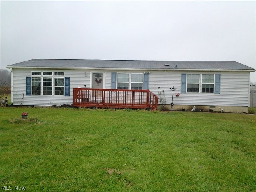 Don't be deceived- this home is truly spacious with lots of character. Sunken living room and kitchen, which includes bar/island. Ceilings are vaulted and give a lighter atmosphere. Master and 2nd bedroom have walk-in closets. Very nice open layout in living, dining, kitchen area. Culligan water treatment system goes with house. Home has a great warm feel and is well maintained. You will be delighted when you take a look. Chandelier in dining room does not stay. Front deck/porch and large deck on rear.