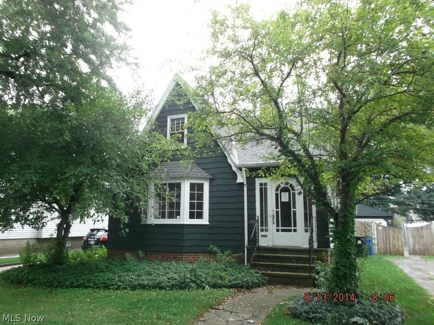 Quality Built Cedar Sided Master Bungalow * Inviting enclosed Front Porch * Large Living room with Decorative Fireplace * Spacious Formal Dining Room with Corner China Cabinets * Loads of Natural Woodwook & Hardwood Floors * Oak Kitchen with Built-in Dishwasher * First Floor Updated Bath * Oversize Master Bedroom on 2nd Floor * HUGE Basement * DEEP Fenced yard with 2 Car Gable Roof Garage * All Room Sizes are Approximate *