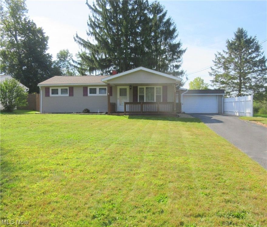 Desirable Open Concept Ranch w/1320 SF, Large Covered Front Deck All on a Quarter Acre Ready to Move Right In! Open Vast Eat In Kitchen w/ Plenty of Cabinets & Counter Space. Range, Fridge, Microwave All Stay. Breakfast Bar Open to the Spacious Family Room (Fireplace TV Stand Stays) Vaulted Formal Living Room. Sliders off Family Room lead to a Charming Concrete Patio & Beautiful Panoramic Backyard. All Great for Entertaining!  Three Nice Size Bedrooms. Separate Laundry Room (Washer & Dryer Included). Two Car Garage w/Opener plus Bonus Storage Area Behind Garage.  Additional Shed for All Your Yard Tools to keep the Garage Nice & Clean. No Worries – Home Warranty Included!