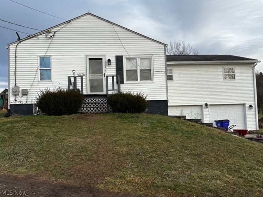 Set on over 2.2 acres in Portage County!!  This 3-bedroom, 1-bath ranch in a rural area offers space, privacy, and potential in a picturesque setting. The home was updated in 2017 with newer flooring and electrical, laundry is on the main floor, providing a solid foundation for your finishing touches. Outdoor features include an out-of-ground pool, a large deck ideal for relaxing or entertaining, and a 2-car garage. While the property could use a little TLC, its location across from a well-maintained golf community adds to the charm and appeal, making this a great opportunity for buyers looking to customize a home in a scenic area.