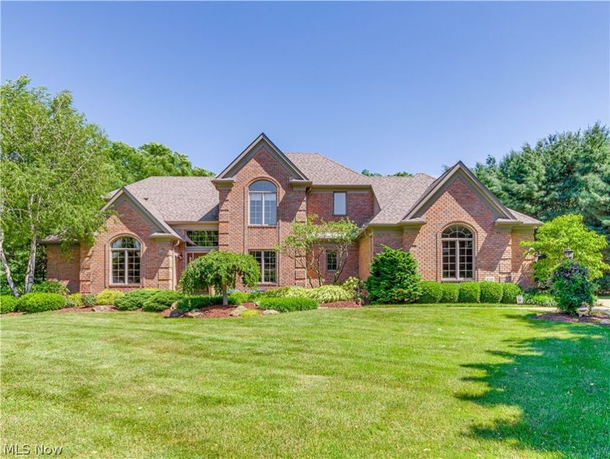 Captivating Home in the Heart of Jackson Township! Located in the desirable Carrington allotment this is a true treasure. Professionally decorated to accentuate the outstanding features like 18ft ceilings in Great Room with stunning fireplace and windows,  vaulted ceiling in Office that has an electric fireplace or beamed ceilings in Dining Room and 1st floor Master Bedroom. Feature walls throughout the main floor give the feeling of total luxury. Large Kitchen has access to the upper composite deck for outdoor dining off of the eat in area. Master Bath boasts a gorgeous tile shower, jetted tub, separate vanities and huge walk in closet. Bedrooms 2 & 3 share a Jack & Jill bath and Bedroom 4 has private Bath. Lower level Rec room in walk out basement has wet bar, full bath and screened porch leading to a Backyard Paradise complete with firepit, hot tub and peaceful waterfall. In the center of a cul de sac this is a private oasis!