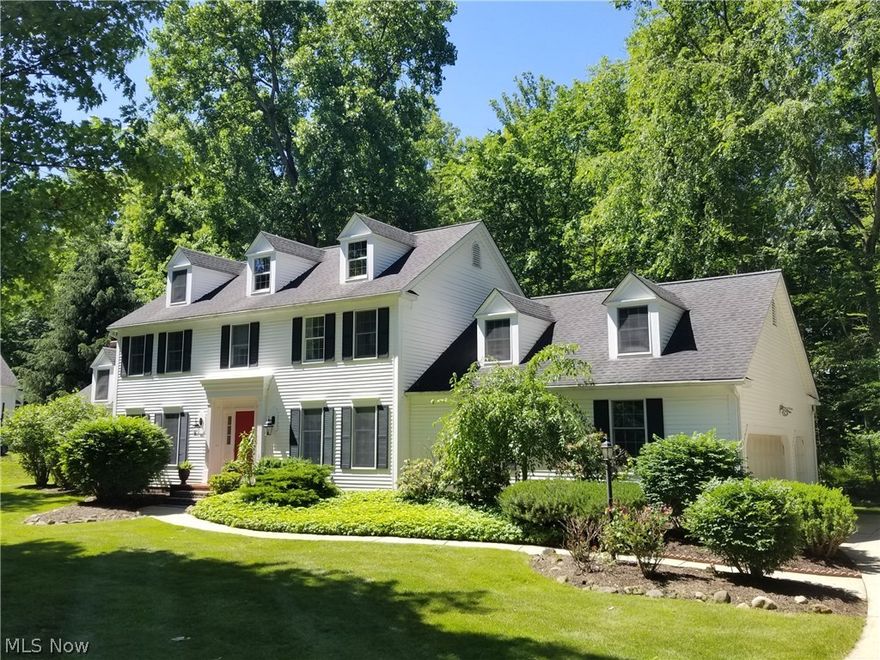 From concept to completion, this gorgeous and elegant Kenneth Payne custom built Hudson colonial has been the Seller’s dream home. From its first impression, to the private views of the lush wooded backyard, it’s a property for the discriminating Buyer. Your friends will enter through a roomy, 12 ft.-wide foyer. Quality design and distinctive appeal lead to an open-concept cooks kitchen that utterly fantastic. A serious cook will be right at home here. Thermador appliances, a separate sink for food prep, lots of warm granite counter space for helpers, a spectacular functional island and  just about any cherry cabinet you can imagine will make you wonder how you did without it! A remarkable office is steps away, with a view of the picturesque backyard. The family room has a vaulted ceiling, wall-mounted television and cozy brick fireplace. The soft blue, gray and white palette brings comfort and style that's calm and cool. The bedrooms and closets are fantastic and the baths are magnifi