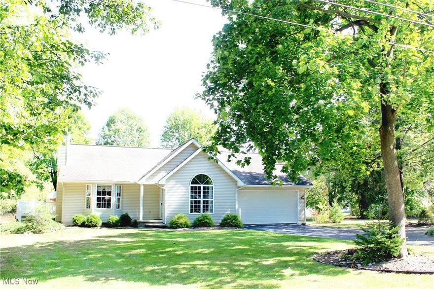 BEAUTIFUL COLUMBIANA RANCH!!!  This VERY WELL MAINTAINED HOME is located close to FIRESTONE PARK!! You will enjoy the OPEN FLOOR PLAN featuring Living Room with GAS FIREPLACE & bay window; Kitchen with oak cabinetry, breakfast bar, custom back splash & all appliances; Dining Area with farm style decor & French doors; Primary Bedroom with large walk in closet; Primary Bathroom with corner WHIRLPOOL BATHTUB, double vanities & shower; Second Bedroom with large closet; Third Bedroom with large closet & French doors (could also be used as a Formal Dining Room); First Floor Laundry located in hall with stackable washer/dryer & utility sink; Bonus Room in basement that could be used as Family Room or Guest Room; Office off of Bonus Room; potential Rec Room area (34'x24'); Two Car Garage that is attached with attic access; Front Covered Porch and DECK for relaxing outdoors. Additional Features include: open staircase with oak steps, three skylights, two sheds and blacktop driveway with turnaround. Newer items include:  high efficiency furnace & central air in 2021 and hot water tank in 2017. You will not want to miss out on this WONDERFUL HOME!! Call TODAY for your Private Showing!!