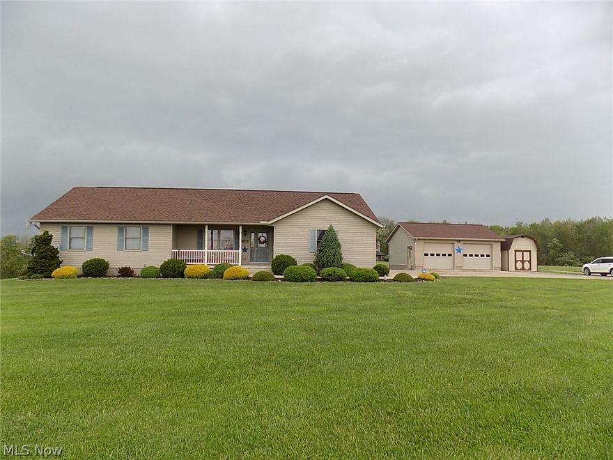 This is a quality built ranch home, it features a beautiful oak ,eat in kitchen . The family room  has a gas fireplace and opens up to the large sunny enclosed porch, with a skylight and leads to a 16 x 16 deck . This home has an open floor plan , and a spacious living room . The master bedroom is exceptionally large , the master walk in closet is 11 x 7. the master bath has a tub shower combo. The great room in the basement has an area that can be used as an extra bedroom, and still has a lot of living space , there is also a full bath with a walk in shower.Then there is all of the storage space, and work shop area , with double doors to the outside. There is a 2 car attached garage, and a 2 car detached garage , beside the garage is a 10 x20 storage building. All you need to do is move in .