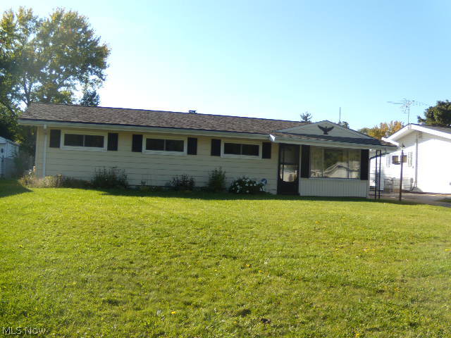 PICTURE PERFECT !!!! You'll be sold the instant you enter this invitingly priced 4 bedroom and 2 full bath ranch. The neutral decor. is just waiting for your personal touches. Up dates include Remolded master bath 2004.Roof 2005, Furnace 2008, Vinyl flooring in the kitchen, bath room and Laundry room 2010.Updated Electric and washing machine 2013. In 2014 second bath was gutted and totally remolded.Replaced outdated title in kitchen. The whole house including walls, ceilings,window trim,front and back door freshly painted as well as new carpet through.Enjoy the fenced in backyard and covered patio for all your entertaining needs.( Stove- the burners work however the oven does not) the appliances are are a gift to the buyer, however not warranted. Please put this on your "A" list of homes to preview.