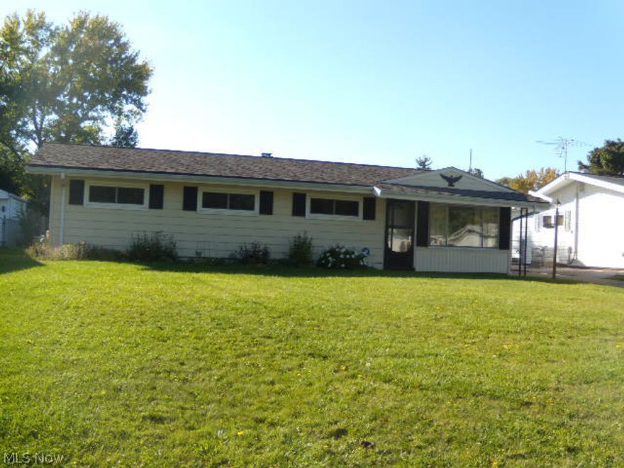PICTURE PERFECT !!!! You'll be sold the instant you enter this invitingly priced 4 bedroom and 2 full bath ranch. The neutral decor. is just waiting for your personal touches. Up dates include Remolded master bath 2004.Roof 2005, Furnace 2008, Vinyl flooring in the kitchen, bath room and Laundry room 2010.Updated Electric and washing machine 2013. In 2014 second bath was gutted and totally remolded.Replaced outdated title in kitchen. The whole house  including walls, ceilings,window trim,front and back door freshly painted as well as new carpet through.Enjoy the fenced in backyard and covered patio for all your entertaining needs.( Stove- the burners work however the oven does not) the appliances are are a gift to the buyer, however not warranted. Please put this on your "A" list of homes to preview.