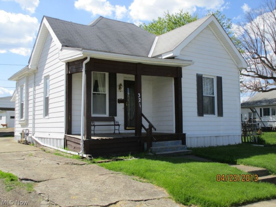Cute 2 bedroom  cottage, nice updates, which includes new vinyl siding, roof, windows, gas furnace, central air and electric upgrade.  Nice front porch, deck on rear, 2 car carport, 1st floor laundry.  Would be a great starter home, an empty nesters, or for an investment.  Move in ready, priced to sell.