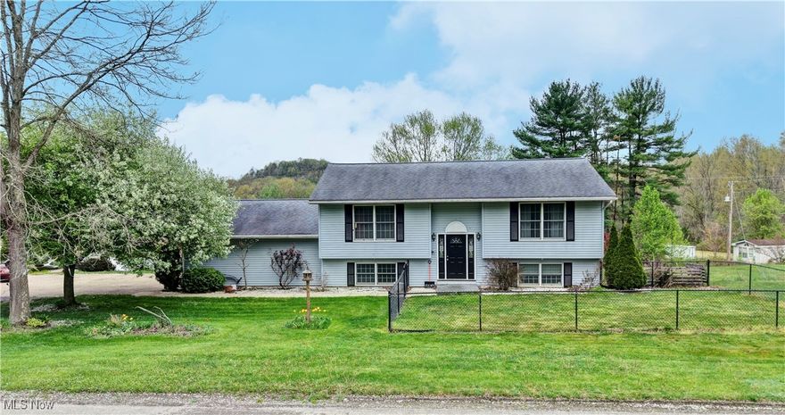 Enjoy the best of both worlds—peaceful country living with quick access to Tappan Lake—in this well-kept 4-bedroom, 2.5-bath home located just outside of town.

Inside, the home features a traditional layout with distinct living spaces, including a bright and comfortable living room and a separate family room that’s perfect for cozy evenings. The eat-in kitchen offers plenty of cabinet space and a casual dining area, making it the heart of the home. Upstairs, the spacious primary suite includes a private bathroom, while three additional bedrooms offer flexibility for guests, family, or a home office.

Step outside to a generous yard surrounded by nature—ideal for outdoor entertaining, gardening, or just relaxing in the quiet countryside. With Tappan Lake less than 5 minutes away, you'll have endless opportunities for boating, fishing, and recreation right at your fingertips.

This property is perfect for anyone looking to enjoy out-of-town living with close access to the lake and easy access to get to town. Schedule your private tour today! Contingent upon sellers finding and closing on home of their choice.