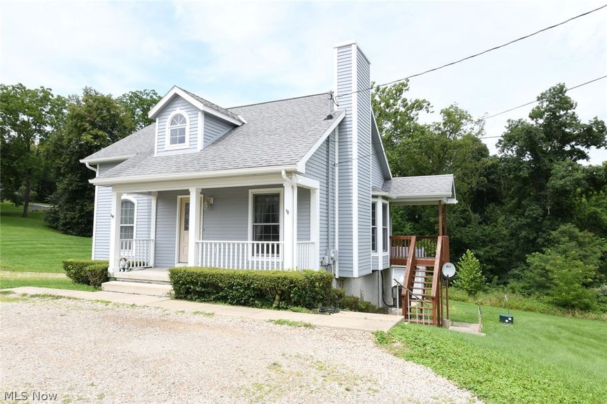 This charming home offers the best of country living. This home was built in 2009 and still feels like a new home. You walk into a home that has hardwood floors and solid doors. There is a living room/dining combination. The kitchen has all the appliances and a pantry.There is a side deck that would be great for grilling.Two nice size bedrooms and a full bath with a sit down shower/tub for safety. There is a pull down staircase to the full attic that could be easily finished. The attic has 3 windows that allows natural light into the attic. The basement has the laundry room,complete with a washer/dryer, office with storage and a gun safe and a full bathroom with a tub/shower combo. The 2 car garage is in the basement. The garage has tons of storage and work benches, ac/heater and a hoist for lifting heavy objects. There are ceiling fans through out the house. The seller is leaving a freezer in the basement. There is a shed  and a large concrete garage pad. The seller has taken great pr