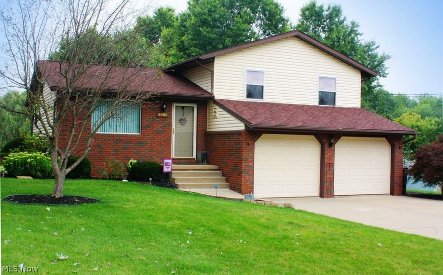 Welcome home! Wonderful 4 level split style home is move-in ready with updates throughout! Located in a fantastic Perry Township neighborhood that offers a country feel yet close to everything you need and everywhere you want to go! This charming home offers a spacious eat-in kitchen with new stainless steel appliances (2013), new countertop, ceramic tile floor and all the cupboard space you have been looking for! The spacious family room with gas fireplace opens to the two tiered deck, that is partially covered, with fantastic views of the backyard and the open field located directly behind this property offers additional privacy. All of the bedrooms feature solid oak doors, smoke detectors, and fantastic closet space! Newly painted interior throughout, brand new furnace (2014), new central air conditioning (2012), double paned vinyl windows with lifetime guarantee (2006), new roof (2011), updated landscaping, water softener and whole house water filtration system. Public water and se