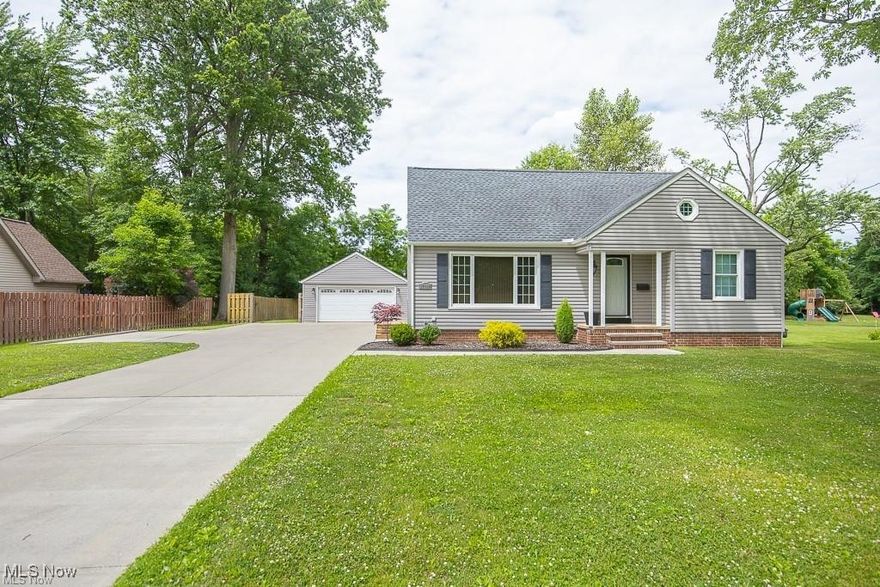 This updated contemporary Cape Cod sits on almost 0.4-acre lot in the heart of Olmsted Falls. Large 18x16 deck overlooks the spacious partially fenced back yard with a firepit. The 2-car garage has a bonus 19x9 room ideal for a workshop, extra storage or pets with a small doggie door. The open and spacious layout brings in abundant natural light. The kitchen boasts large counters with ample cabinet space and all appliances, plus easy access to dining area which overlooks the deck. Master bedroom features double closets and a large loft area for an office or sitting area; 2 additional spacious bedrooms on the first floor. Convenient updated full baths on both first and second floors. Lower level offers a large, finished rec room plus plenty of storage space, a separate laundry area and even space for a studio area. New garage roof (2024). Elongated driveway with a large turnaround and extra parking space. Located close to downtown Olmsted Falls with all the unique shops and restaurants. Easy access to I-480 makes commuting easy. This home is a true gem, offering both modern updates & plenty of outdoor space. Set up a private tour today!