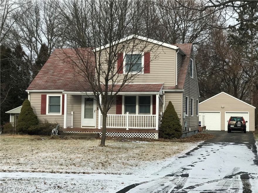 Are you looking for a low-maintenance vinyl-sided home in Kent, Ohio on a little-traveled dead end street near Kent State University? How about the often-desired 4-bed, 2-bath with a first floor bedroom and 2+ car freshly painted garage? Well you may have discovered your next home! The curb appeal alone will have you in its grasp with wonderful front porch and relaxing rear deck made of "no-stain" trex-style composite decking and "no-paint" vinyl railings! Plus newer vinyl siding home exterior! You'll be greeted by hardwood in the cheerful south-facing living room and fresh paint throughout. Two bedrooms on the first floor w/ a full hall bath. Climb the newly-refinished stairs to the second story which boasts generously-sized Master Bedroom w/ dormer niche that could be used as a nursery, office space, etc... Discover your use! Bedroom 4 and second bath rounds out the upstairs. Full basement with drywalled rec room will provide another living space w/ just a few touches from the buyer.