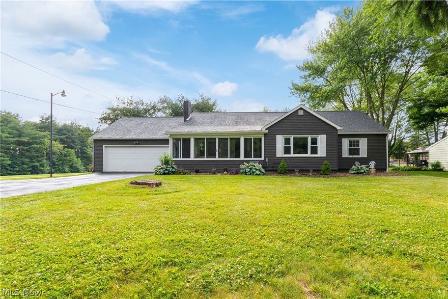 Wow! Check out this extremely well kept and updated Ranch home located in Jackson LSD!!! (just minutes from Amherst elementary school) This lovely home has been owned by the same family for over 50 years and has been recently updated from top to bottom! Walk inside and be amazed by a large open concept Kitchen/ dining space that includes new cabinets (2020), an oversized kitchen island with a gas range in the middle (2020), stainless steel G.E appliances (2020), and recessed lighting! All new LVP flooring throughout the dining, kitchen, living room and hallways! The living room is large and open to the kitchen area which makes it wonderful for entertaining! It also features a wood burning fireplace! Make your way down the hall to find a guest bathroom that was also updated in 2020 with Carrara tile, a new vanity and sink, toilet, and bathtub/ shower. This beauty has 3 large bedrooms on the main level including a master suite with it's own walk in closet, tile shower and dual vanities! All 3 bedrooms had new carpet installed in 2020 as well. Downstairs has also been remodeled and includes a carpeted basement living room area, an LVP area used for recreation or bar for entertaining guests. The other side of the basement is used as a workout area, storage, and large laundry space! Newer washer and dryer will stay with the home. Make your way out back to enjoy a massive stamped concrete patio that includes a fully functioning hot tub and an outbuilding for plenty of storage. The attached 2 car garage offer plentiful space for parking trucks, SUV'S and having additional room for storing items!