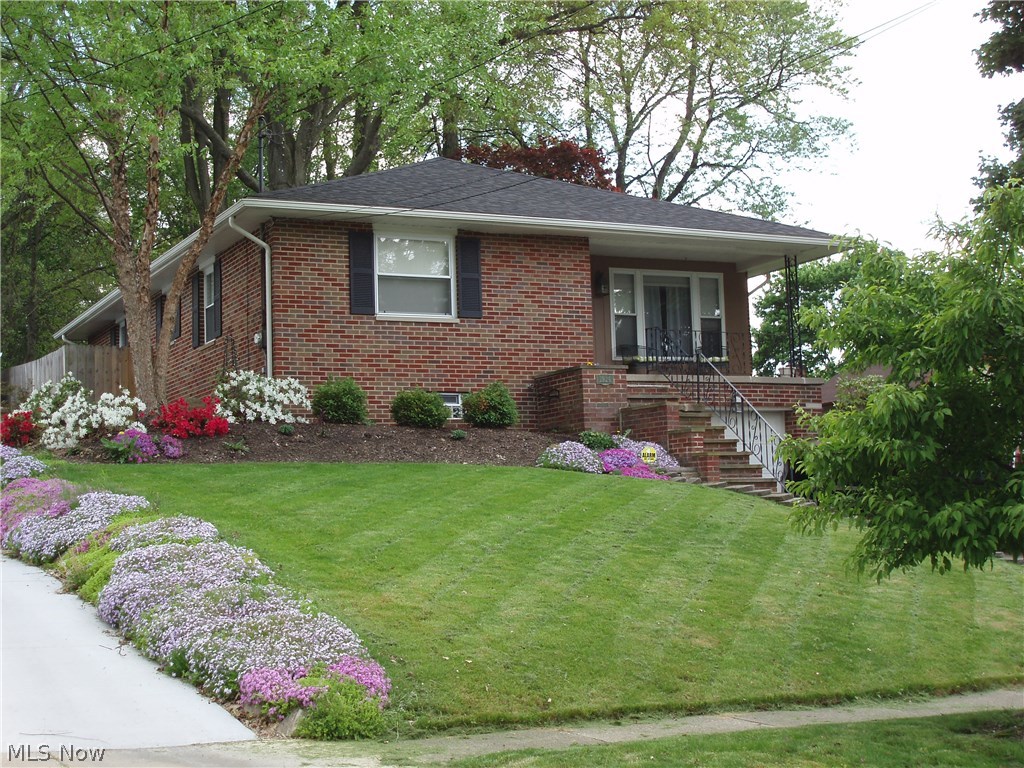 WOW!!! Very nice raised ranch. Lower level with hand crafted bar and built-in wine rack in Rec.Room, 3 bedroom and full bath with walk in shower. Laundry room with built-in cabinets and desk area. Main floor has 2 large bedrooms with hardwood floors and full bath with soaker tub. Gas log Fireplace in the Living room. Fenced in backyard with patio