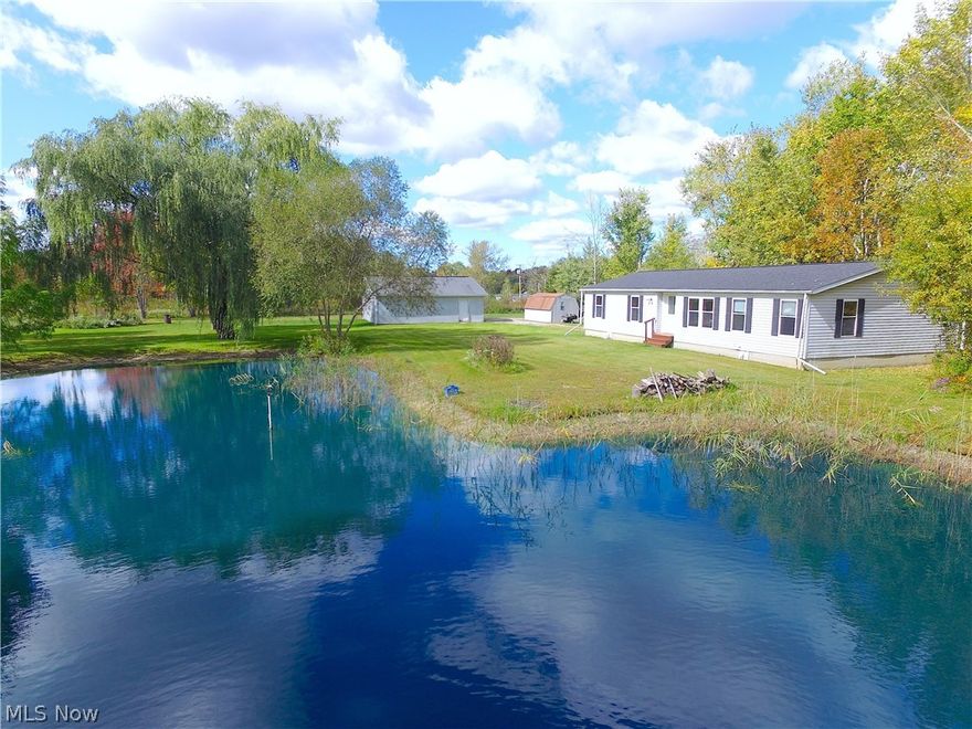 From the minute you pull into the driveway, you will feel at home on this amazing park like property. Whether you are relaxing in the shade of the two willow trees next to the beautiful pond, playing outdoor games in the large grass areas, or exploring the wooded trails, you will know this is the right place for you and your family. Inside you will find an owners suite that has an attached bathroom with a garden tub plus separate shower and a walk-in (or walk-through) closet. All of the bedrooms as well as the large living room offer window views the beautiful pond. The owners suite is also separate from the other bedrooms with well designed floor plan. A new roof was put on the house in the fall of 2016 along with new plumbing fixtures plus cabinet hardware in kitchen and both baths 2017. All new lighting fixtures and 2 new ceiling fans. This home is all electric with back-up propane heater and also a generator wired into the breaker box. Whole house water filter system is already ins