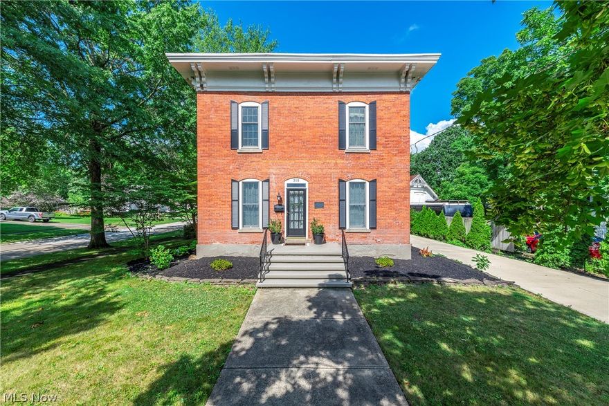 Welcome to 318 Courtland, a stunning Italianate home nestled in the heart of Wellington’s coveted historic district. Tastefully updated, this exquisite property effortlessly combines timeless elegance blended with modern convenience, offering an unparalleled living experience. Step inside and be greeted by soaring ceilings, beautiful fireplaces, arched doorways, large molding, and grand windows that flood the space with natural light. Enjoy the historic charm and comfort throughout. This home features a spacious 1st floor primary suite with new LVT flooring and an updated en-suite bathroom with heated floor tiles, keeping your toes warm year-round. With 2,296 sq ft, this home has a functional floor plan while providing ample space to entertain and impress your guests. Upon entry, the formal living room and parlor have built-in bookcases, a gas fireplace, and a beautiful staircase. The centrally-located formal dining room is a gem, ideal for hosting intimate dinners or family gatherings. The modern and bright kitchen features updated stainless steel appliances, custom cabinetry, and plenty of counter space, making it perfect for both everyday meals and special occasions. The cozy family room boasts new LVT flooring and a stone fireplace, perfect for relaxing. Upstairs, 3 spacious bedrooms with tall ceilings offer decent closet space for a home of this era. The enormous, updated full bath includes a deep tub to enjoy a long soak. Outside, the large yard offers a peaceful escape, with mature trees and lush landscaping providing a serene backdrop. Enjoy your morning coffee on the patio or host summer barbecues in this picturesque setting. The basement includes laundry, an additional toilet, and a walk-out feature, adding convenience and versatility. The large 24x24 garage features a storage loft. Located just a short stroll from Wellington’s charming downtown that offers a variety of shops, restaurants, and cultural attractions. Schedule your private showing today!