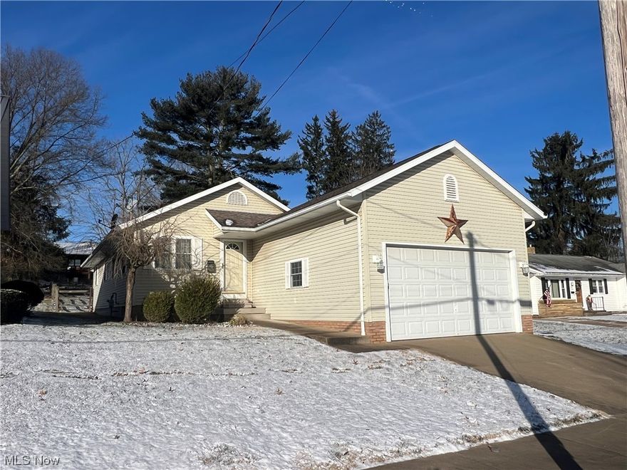 Like new 3 bedroom, 2 bath vinyl sided ranch.  Oak woodwork throughout.  Oak kitchen with island breakfast bar and sliding glass doors to the large patio.  Master bedroom with full bath.  Finished rec room in the lower level.  2 car attached garage.  Split rail fenced back yard.  Excellent location, close to Tuscora Park!  Room sizes are estimates.