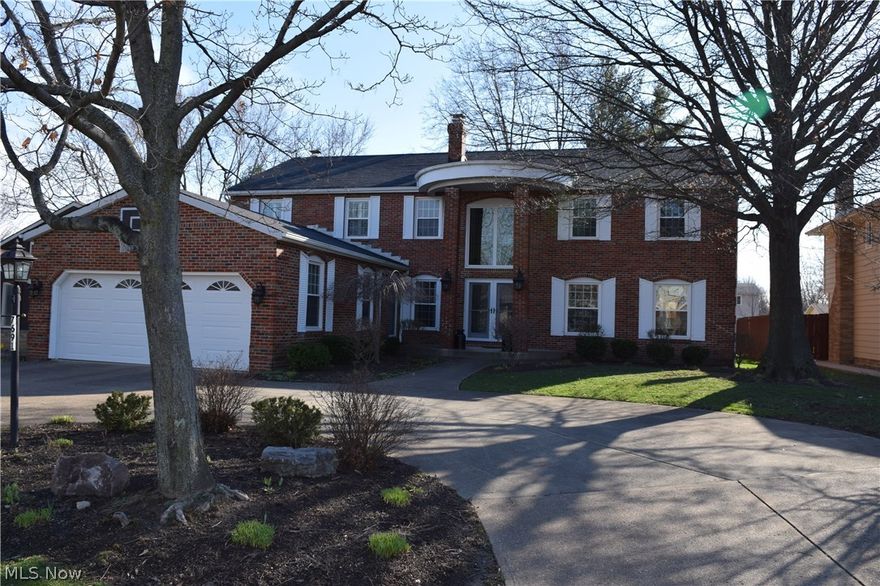 Built to impress, stately all brick colonial features over 6200 square feet of finished living space to entertain your family and friends. You can greet them in your beautiful two story foyer featuring marble floor and curved stair case over looking the formal living and dining rooms. Or you can cozy up with family around the elegant fireplace in the family room which features a wet bar and wood beam ceilings, which leads to a beautiful sunroom and covered patio. Beyond the covered patio is an additional patio and expansive backyard for plenty of room for outdoor entertaining. The first floor also features a private office, first floor laundry, a gourmet eat-in kitchen, and two half baths. The walk out basement features a full recreation room with an additional wood burning fireplace, a separate billiard room, along with an additional office which could easily be converted to a game room, craft room, sixth bedroom, or use your imagination. In addition their is a full bath and dance stu