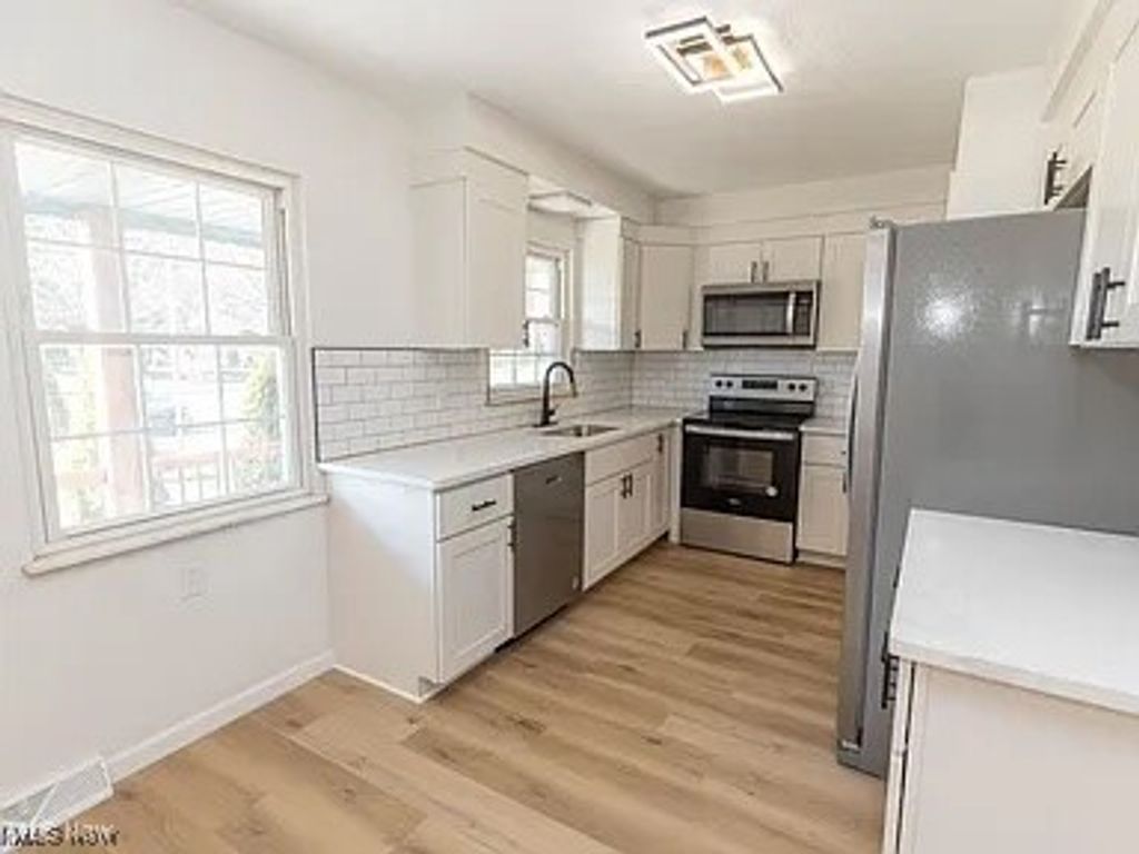 Photo of 5099 W 220 Street, Fairview Park, OH 44126 (MLS # 5182045)