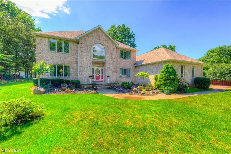 Welcome Home! This fantastic all brick home was built with love and attention to detail! Roof & Windows are all new in the last couple years. The entry is a grand two story design with tile floor, lots of natural light and a sweeping curved staircase. There is a formal living room with decorative ceiling detail, formal dining room with tray ceiling and double crown moldings, family room with an all brick feature wall and wood/gas fireplace. Kitchen has tile floor, eat in area, beautiful wood cabinetry, center island, desk area and sunny natural light. First floor also offers full bath, 1st floor bedroom and first floor laundry room. Upstairs has Master Suite with glamour bath and two walk-in closets, two additional bedrooms and full bath. Lower level has large recreation room, full bath and additional kitchen area. Backyard is spacious and open with room for garden and relaxation. 3+ Car Garage! So much house and yard for the price!