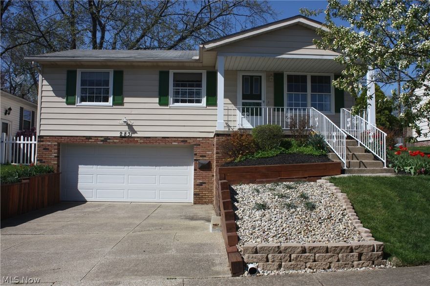 The charming front porch welcomes you into this bright and clean, move-in ready home.  This 3BR raised ranch home shines with pride of ownership.  A spacious family room offers a place to relax or enjoy company, and opens to a recently updated eat-in Kitchen.  The newer stove and microwave are a cook's delight.  The newer flooring and light fixture add the finishing touches.  The full bathroom features an updated tile surround shower/tub combination and plenty of storage space.  You will be impressed by the large Master Bedroom and the updated master bathroom provides another roomy shower area. Two other nice-sized bedrooms and large closets in all bedrooms complete the main floor.  The lower level provides usable living space as well as a place for laundry and mechanicals.  A lower level storage room is perfect for seasonal storage.  There is an over-sized 2 car garage (20' x 30') providing plenty of room for a workshop or toys for those of all ages!  New A/C installed 5/19 ready for