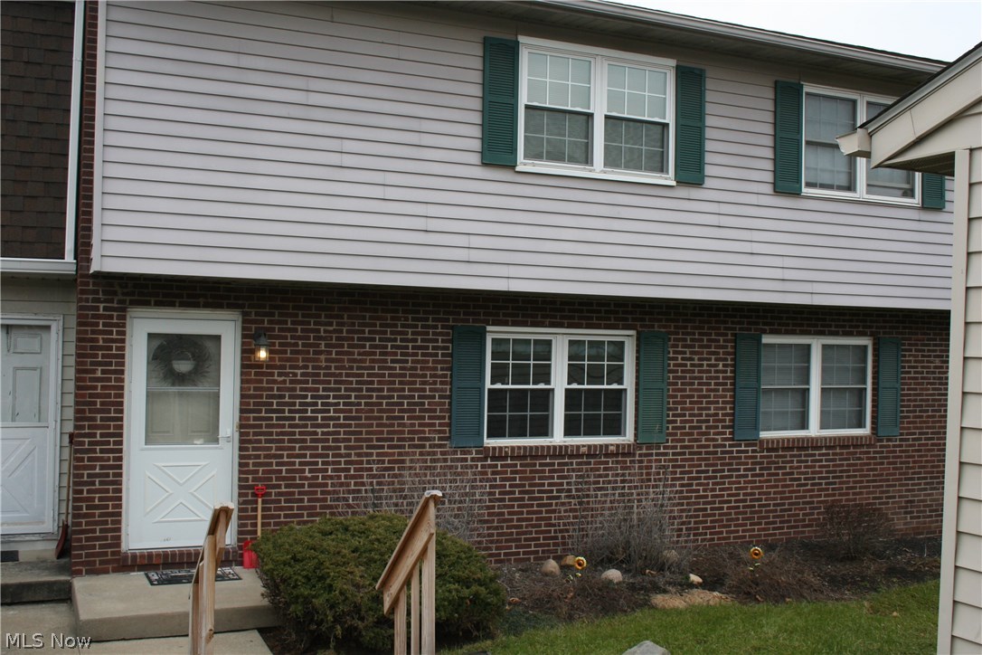 This spacious condo features a first floor half bath, a large living room with a cozy stone fireplace and a slider going out to a deck that overlooks a wooded area. The kitchen has all appliances and an eating area that has plenty of room for a full size table. The master bedroom is roomy with ample closet space. With a large walkout basement, the options are open. Some added benefits are, a reverse osmosis system for the water, front windows, front door and screen have all been updated, the furnace and air conditioner were both replaced in 2003, and a security system is installed. Washer and dryer are staying with condo.