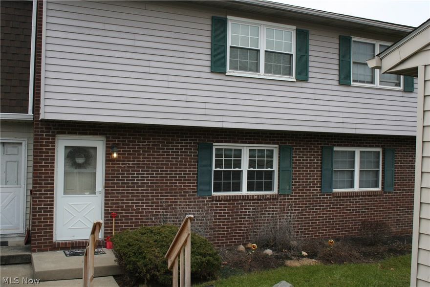 This spacious condo features a first floor half bath, a large living room with a cozy stone fireplace and a slider going out to a deck that overlooks a wooded area. The kitchen has all appliances and an eating area that has plenty of room for a full size table.  The master bedroom is roomy with ample closet space. With a large walkout basement, the options are open. Some added benefits are, a reverse osmosis system for the water, front windows, front door and screen have all been updated, the furnace and air conditioner were both replaced in 2003, and a security system is installed.  Washer and dryer are staying with condo.