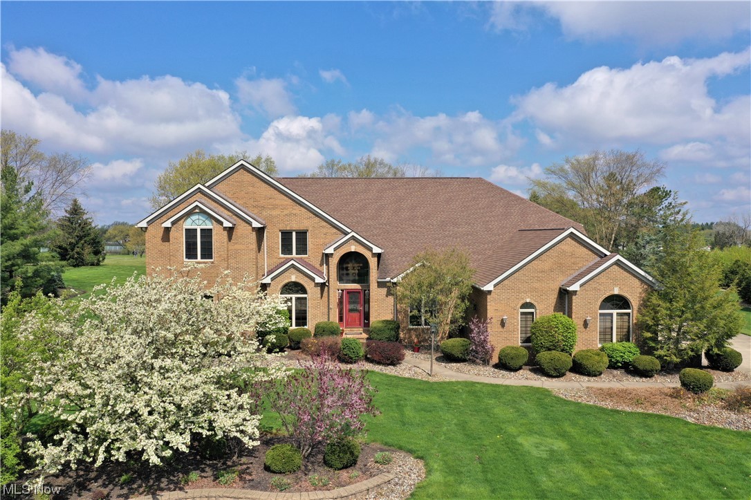 This stunning luxury home is located in the prestigious Fox Meadow Community. The home boasts over 7,000 sq ft of finished living area. The Great Room, dining, and fabulous spacious kitchen form the heart of this home and create a beautiful open space with perfect integration between them. A highlight is the private wing to the left of the foyer. Here we find the first-floor laundry, the very spacious master suite w/fireplace, beautiful red oak flooring, glamour bath w/large tiled shower, walk-in closets, and its own patio in a lovely setting. Continue down the hallway to the 2nd first floor bedroom w/en suite bathroom and walk-in closet. The first floor is completed by a large office to the right of the foyer, living room, half bath and stairway. The second story has 2 additional bdrms both with en suite bathrooms, a second large office and a bonus room. The lower level has a large recreation area, an entertainment bar, wine room, fitness/media room, half bath, and abundant storage. T
