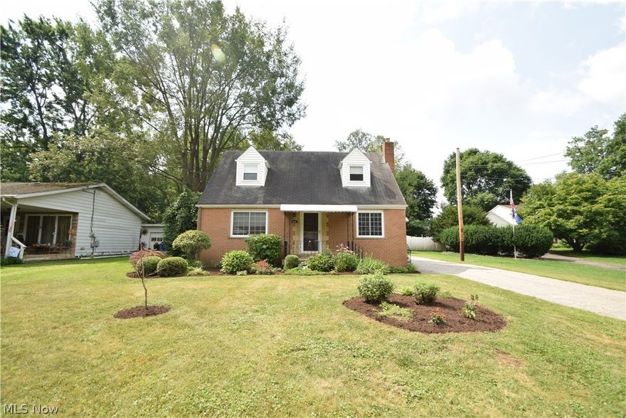 Beautiful well cared for all brick home with many updates to show case it's beauty. This home welcomes you with rich looking floors from Baird Brothers fine hard woods. Floors flow throughout first floor bedroom and dining room. Kitchen has been updated and has ceramic tile flooring with appliances that stay. Main bathroom is on the first floor and also has been updated.  Don't miss the solid 6 panel oak doors and 6 inch oak baseboards which add a rich detail to your living space.  Home also features all new lighting and custom blinds on newer windows. Freshly graveled driveway to accent beautifully manicured exterior and new front door round out this very cozy cape cod. Come see before it's gone.