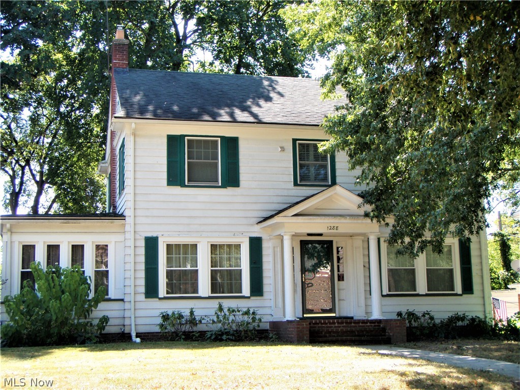 Charming, classic center hall 2.5 story Colonial featuring entry foyer, crown molding, large living room w/gas fireplace. Solarium with all new windows. Most other windows were replaced within the past 7 years. Remodeled kitchen w/eat-in area. Half bath on first floor. Formal dining room. Beautifully refinished hardwood floors in living and dining rooms. Spacious master w/new carpet and double closets.Interior WD shutters. Possible 4th bedroom or bonus room in attic. 2 car attached garage. On bus line. Rest easy...Home Warranty provided!