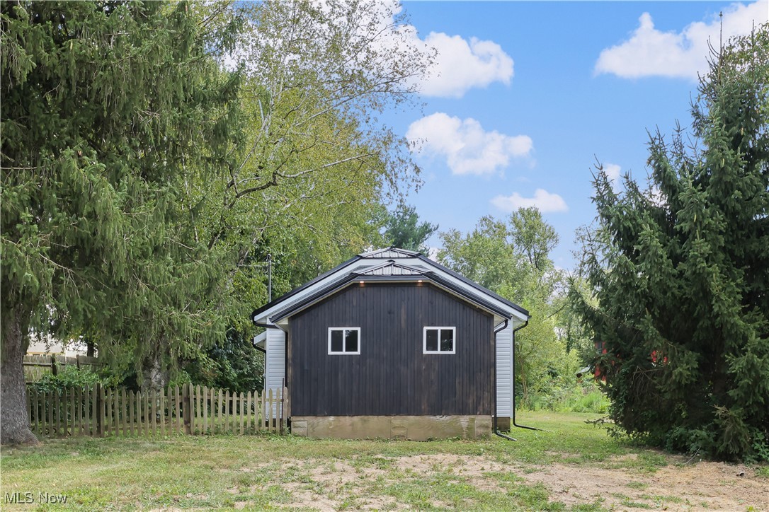 Enjoy country living with a super low maintenance home! The list of updates is impressive and includes new siding, roof, NEW windows, gutters and downspouts. Inside, the beautiful kitchen includes custom, solid wood cabinets. New flooring, paint, plumbing, electrical and fixtures! The original floorplan was changed to now include a 3rd bedroom or office area. Outside, the spacious back yard is bordered by trees, creating privacy and plenty of room for play.
