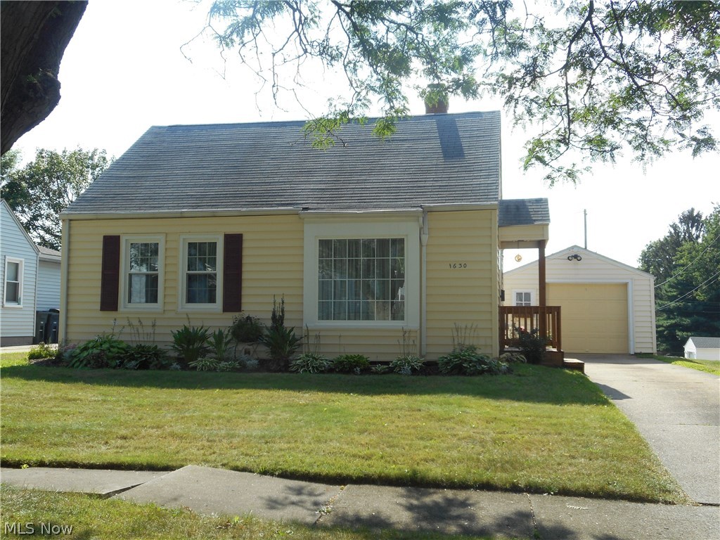 Super cute and clean! Winning the 2017 Beautification Watch Award from the City of Akron, this home is warm and cozy. The expansive, eat-in applianced kitchen offers plenty of cabinet and counter space and has an area for a coffee station! The family room/all season sunroom is conveniently located off the kitchen with access to the extra-large backyard that is nicely landscaped. The partially finished basement has been professionally waterproofed and provides additional living space that is functional and comfortable. Updates include: Many windows throughout, plumbing, stove, sink, kitchen flooring, furnace and hot water tank - all since 2014.