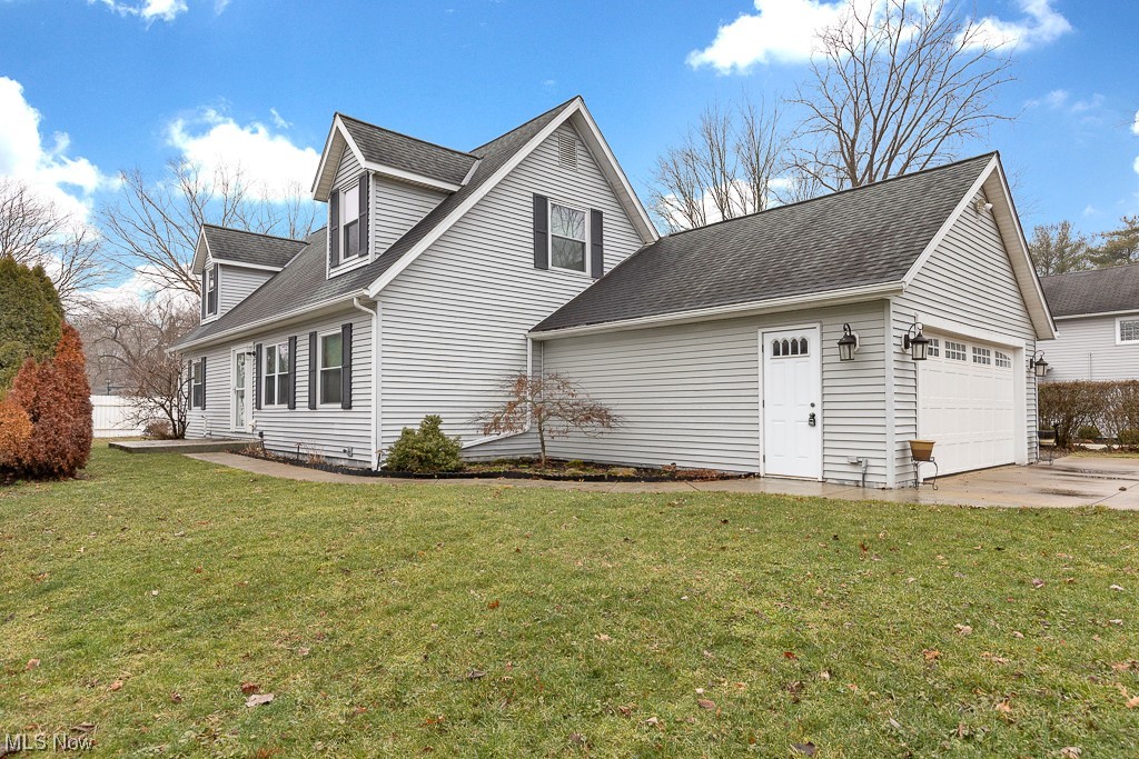 Welcome Home! Gorgeous Cape Cod in the Heart of Olmsted Falls! 4 Bedroom 3 Full Bath with Updates Throughout. Enter Newer Front Door into Expansive Carpeted Living Room. Updated Kitchen includes; Newer Cabinets, Granite Counters, Kitchen Island w/Granite and Overhead Pot/Pan Hanging Rack, Garbage Disposal and Under-Cabinet Lighting. Attached Dining Room has Sliding Doors Out to Rear Patio. Master Bedroom is Spacious and Features a Private Glamour Bath w/Dual Vanities. 2nd Bedroom, Guest Full Bath and Laundry Room Round out Main Level. Upstairs Presents 2 Large Carpeted Bedrooms and the Third Full Bathroom. Indoor Accessible Crawlspace is Clean & Dry, and has Lots of Space for Storage. Outside has Patio, Deck, Privacy Fence, Newer Extra Wide 3 Car Driveway, Roof, Gutters & Stamped Concrete Walkway to Front Door. Newer Ultra Quiet 2 Zone Carrier Furnace & A/C, Tankless Water Heater, Updated Electrical 200 Amp Panel, and Insulation. Close to Shopping, Highways, Metro Parks, and Historic Downtown Olmsted Falls. Owner providing One Year Home Warranty. Don’t Miss Out on this Fantastic Home!!