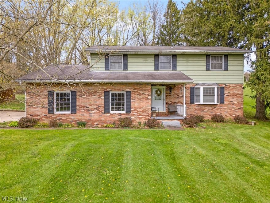 Welcome home to this spacious and inviting 2-story Colonial located in the highly desirable Green Local Schools district! Offering 4 bedrooms, 2.5 baths, and 2,160 sq ft of comfortable living space, this home sits on a beautiful .6887-acre lot with room to relax and enjoy. Inside, you’ll love the warm and welcoming layout featuring a cozy gas fireplace in the main living area, perfect for chilly Ohio evenings. The fully applianced kitchen offers an abundance of cabinetry and workspace while overlooking the family room, creating the perfect setup for guests to mingle with the cook while entertaining. The charming 3-season sunroom provides the ideal place to unwind with morning coffee or host family and friends. Upstairs, you’ll find four generously sized bedrooms including a spacious master bedroom. Additional highlights include a 2-car attached garage, ample storage in the full basement, and a peaceful setting with plenty of outdoor space. Don't miss this wonderful opportunity to own a classic Colonial in a sought-after location close to shopping, dining, and schools!