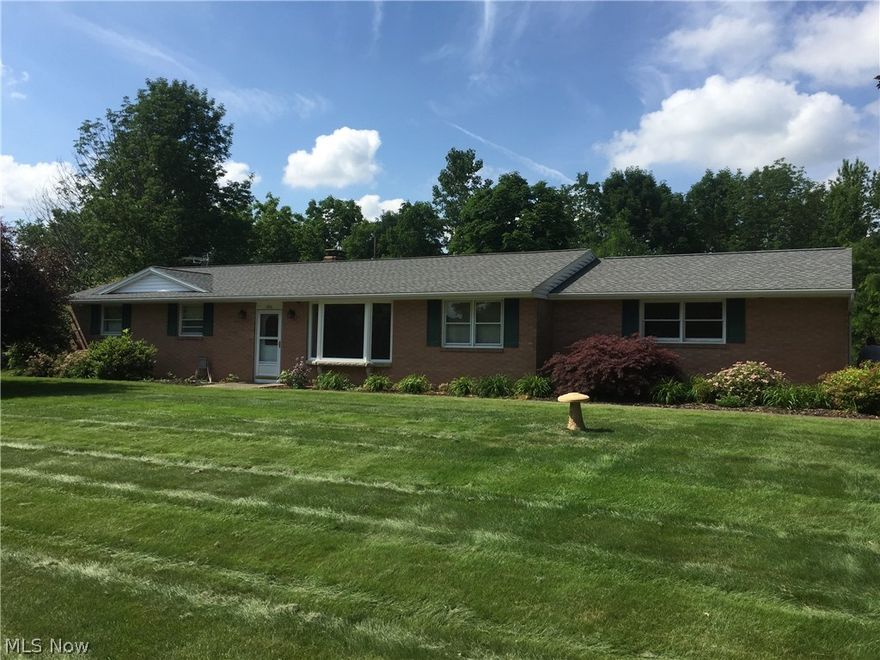 Beautiful 3 bed - 2 bath brick ranch home- This home features hardwood floors - Fireplace in the open concept family- dinig- kitchen area. All appliances stay. There is lots of additional parking, a 20x12 storage barn. Partially fenced in backyard. Nothing to do but move in and enjoy the private backyard. This home features hardwood floors, a jetted tub in the main bath.
The screened in porch looks out on the beautiful wooded view and partially fenced in back yard.