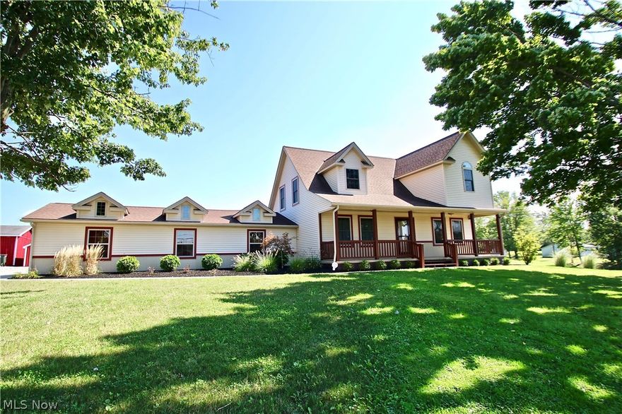 This estate offers you up to 40 acres or a minimum of 3 acres, currently being listed at 5 acres with house and barns, the land is negotiable.  Property has a pasture with electric fence, larger lot if chosen has a ravine in the back, small creek and small pond. Wildlife galore! 60x100 indoor riding arena with 14ft ceilings, 2 wings of stalls: 30x60 with 12ft ceilings and 30x72 with 12ft ceilings, a third storage 26x28 wing, phone, water and electric to barn, shed, attached 3 car heated garage with an extra generator panel transfer switch (not hooked up), 400 amp commercial service from the road is split with 200 to the barn and garage, then house on the other 200. The open 6x36 porch on the front of the house brings front porch sitting to an all new high. The enclosed, glass sliding doors/windows on the back 6X36 sun room is attached to the garage and makes for a winter friendly covering to get into the house in cold seasons and a pleasure to enjoy a summer night breeze minus the bug