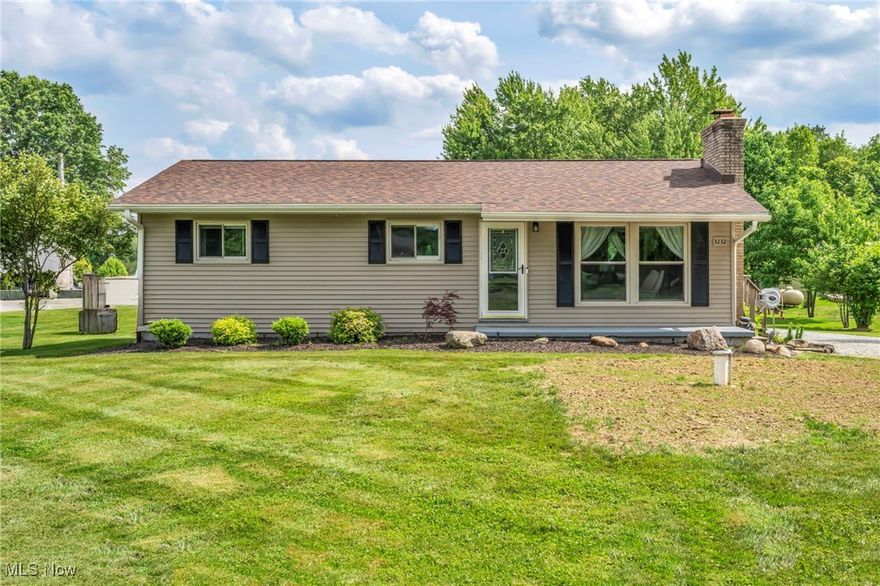 Looking for that cozy home with a country vibe and modern updates? Welcome to 3232 Rohrer Road! This sweet 3-bedroom ranch in the Wadsworth Schools has everything on your wish list, including a finished basement that’s basically an entertainer’s dream.

Inside, you'll find warm engineered hardwood floors in the living room, a charming fireplace, and loads of natural light. The galley kitchen is super functional with plenty of cabinet space to fit all your needs. Down the hall, the bedrooms are finished with gorgeous real hardwood floors that have been freshly stained. While the bathroom is very large with a beautiful dual vanity!

And then there’s the basement: a fully finished hangout space complete with a cozy rec room, custom bar area, laundry room, and extra storage, plus it leads right out to your garage! The possibilities are endless!

Updates? You bet! Roof, AC, furnace, hot water heater  all 2022. Brand new well (Oct. 2024), upgraded septic with UV light, AND two sump pumps with a backup battery for extra peace of mind.

Outside, enjoy over half an acre with a beautiful backyard, deck, and circular gravel drive. Country setting? Yep. But still just minutes to everything in town.

Come see what “move-in ready” really means. You’ll love it here!
