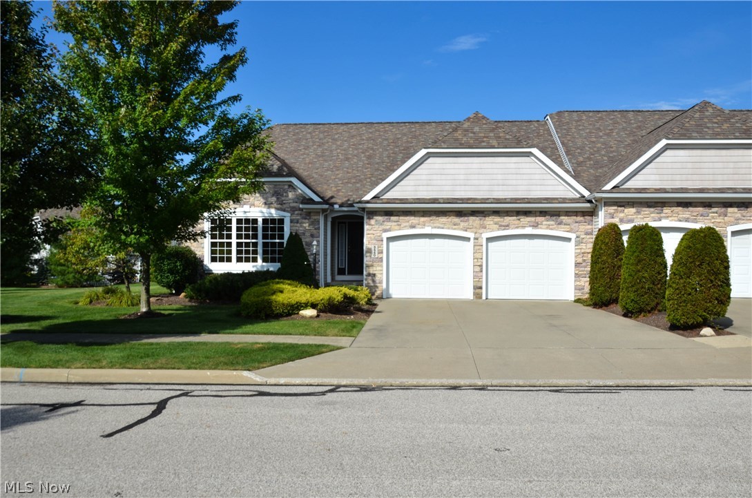 Beautiful Ranch in North Point at Hunters Crossing offered for sale by the original owner! Enjoy maintenance-free living in this multiple award winning luxury condominium community. Convenient access to the Cuyahoga Valley National Parks, Great Shopping, Restaurants, Highways and more. This Contemporary Ranch home features an open and airy floorplan with vaulted ceilings, a fireplace, a den and a first-floor laundry. The Eat-in kitchen is equipped with stainless steel appliances. Patio overlooks a large green space and scenic pond in the back. The landscaping is well designed and meticulously maintained - just sit back and enjoy the setting! The Master Suite also has vaulted ceilings, a large walk-in closet and a spacious bath with both a garden tub and a shower. Attached two-car garage with water and a drain. Plenty of storage space available in this unit with a full basement. This unit does not pay for water April through September as the Association draws water for landscaping spri