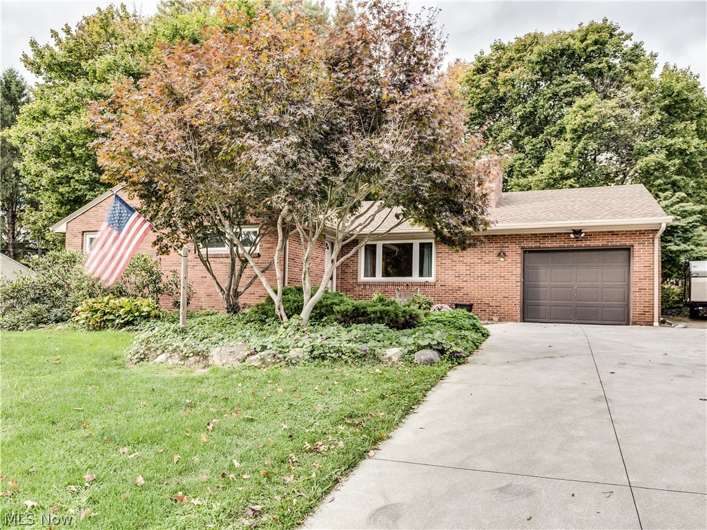 You will be pleasantly surprised when you walk in and see how modern & spacious this 3 bedroom, 3 bath ranch Is with 1862SF plus an additional 300SF in basement, 3 car garage (1 car attached, 2 car detached) on 1 acre* So many updates including a vaulted kitchen, dining & sunroom with 2 skylights* Kitchen with custom made cabinets with roll out shelves, island/breakfast bar, chefs pantry, desk, ceramic back splash, updated appliances, built in electric over (4 yrs.) plus dual fuel range, 3 door French style refrig (2 yrs), dishwasher (2016) & ceiling fan* Sun room wrapped with windows, gas stove with blower & access to patio* Living room with wood floor, wood burning fireplace with gas wood burner insert, built in cabinets & fan* Wood floors in hall & bedrooms* Master with updated bath & fan*Updated guest bath* Lower level with rec room including pool table, glass block windows, full bath & workshop* 1 car attached with opener & 220 amp* 2 car (24x24) detached (2010) with opener & wir